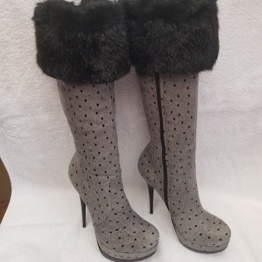 Beautiful animal themed tall designer boots .